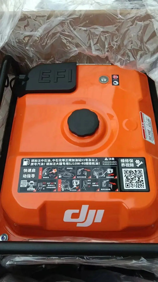 DJI Agras T100 orange sprayer tank top with circular fill cap and warning labels