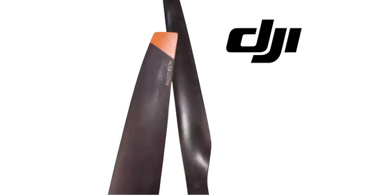 DJI T100 propeller pair close-up, dark blades with orange leading-edge tips