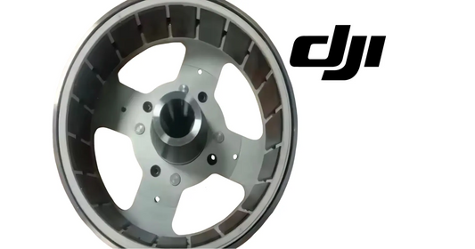 DJI magneto rotor with dark outer ring, silver center hub, four inset blades