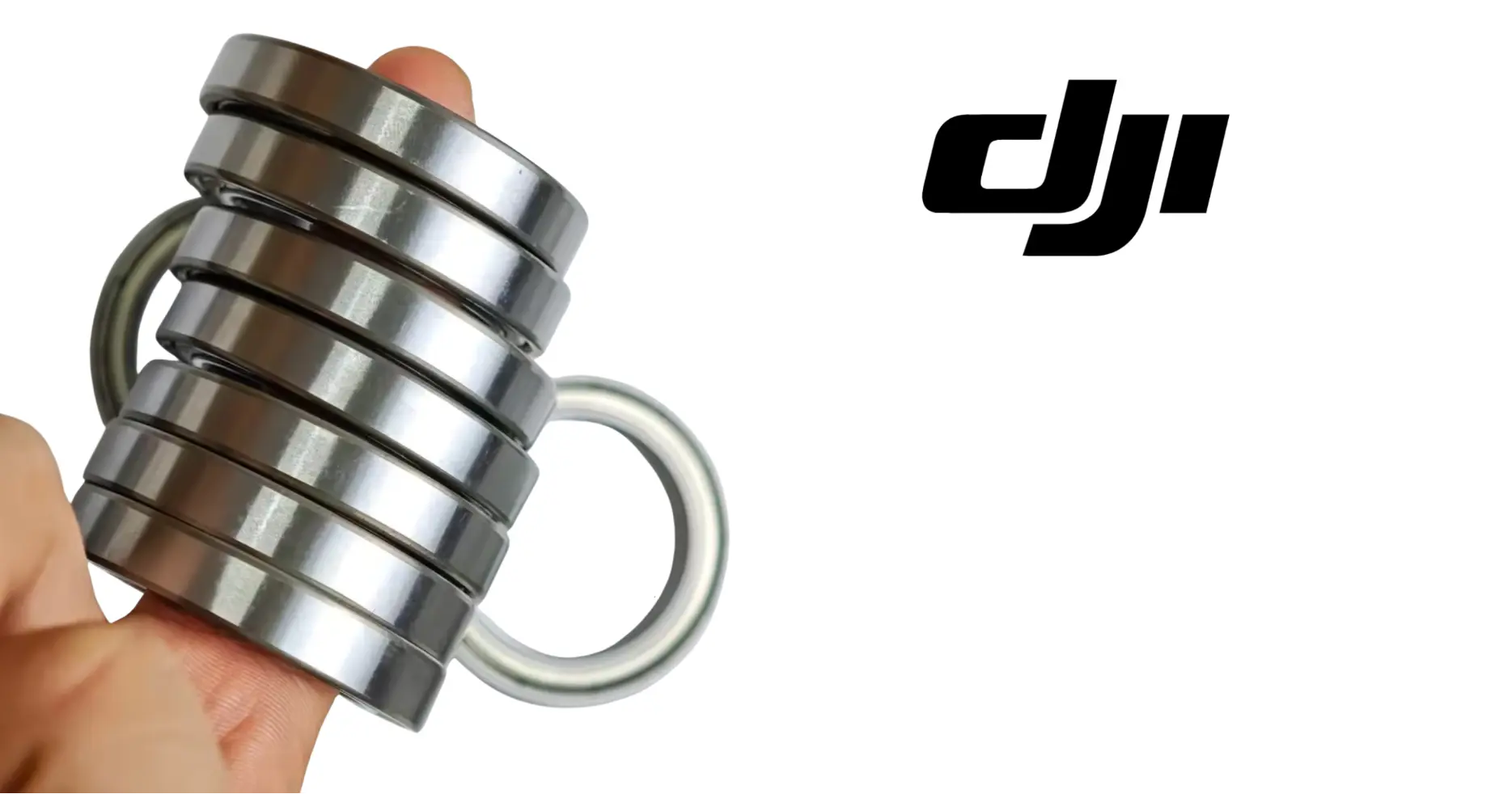 DJI motor bearing set showing stacked metal rings and a curved wire