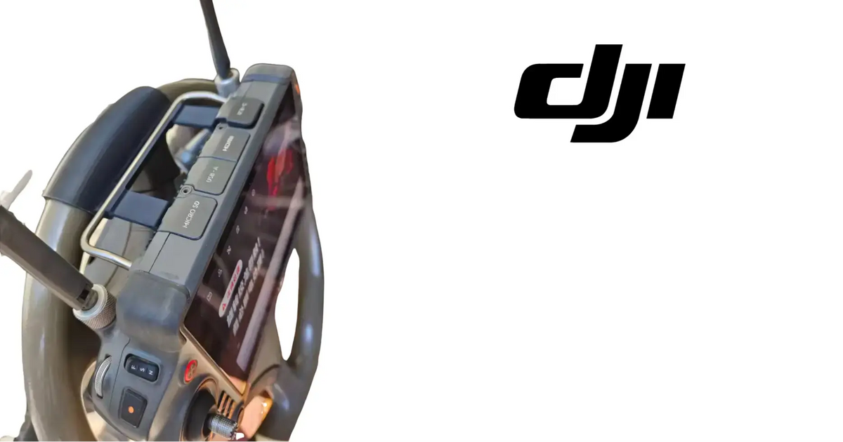 DJI Matrice remote controller wheel steering mount on a frame with visible display