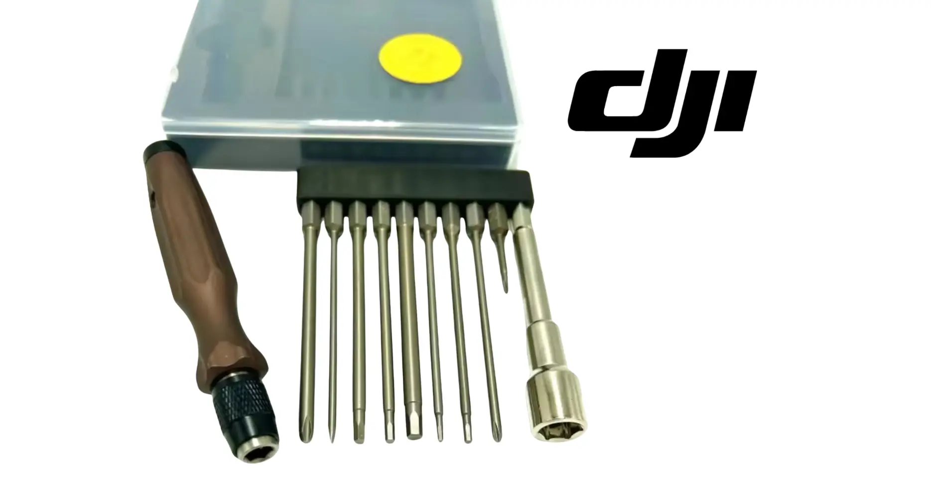 DJI Agras screwdriver with brown handle and multiple long bits in tray