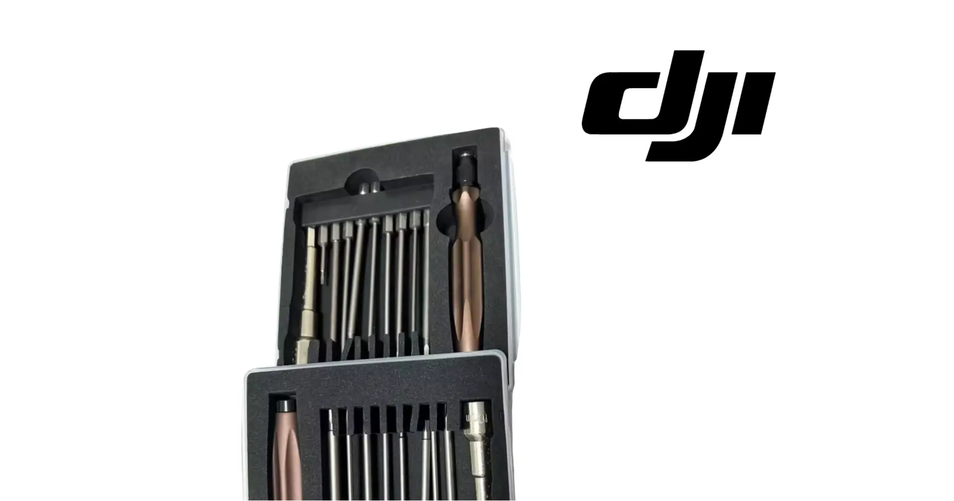 DJI tool kit case open with assorted bits, screwdriver, and tools