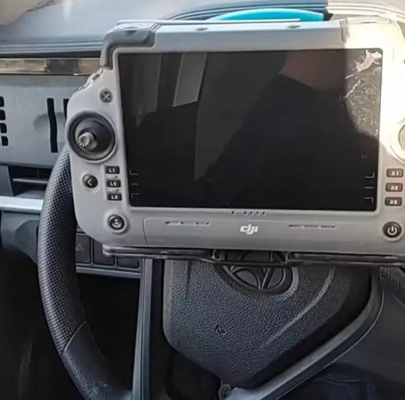 DJI Matrice remote controller wheel steering mount with textured grip and display panel