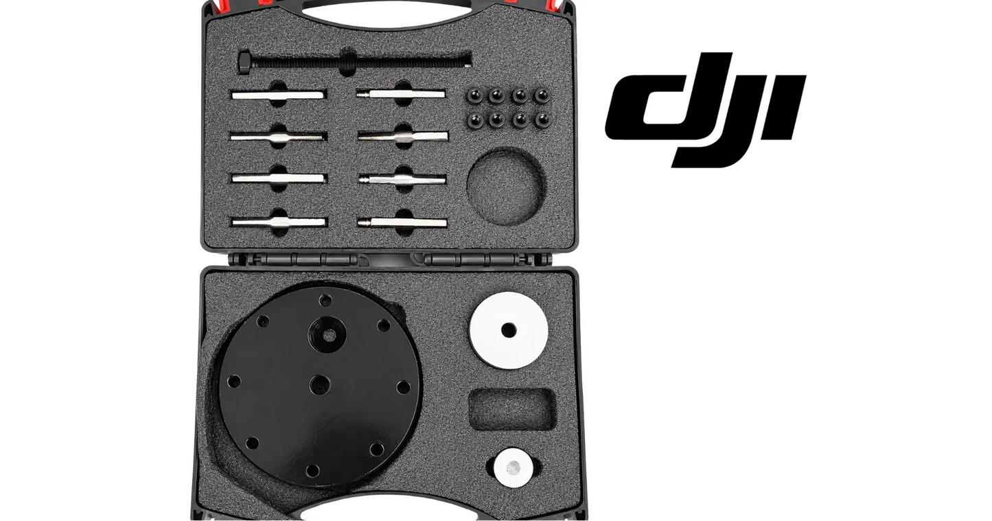 DJI propulsion motor bearing repair tool kit in open black case with circular plate