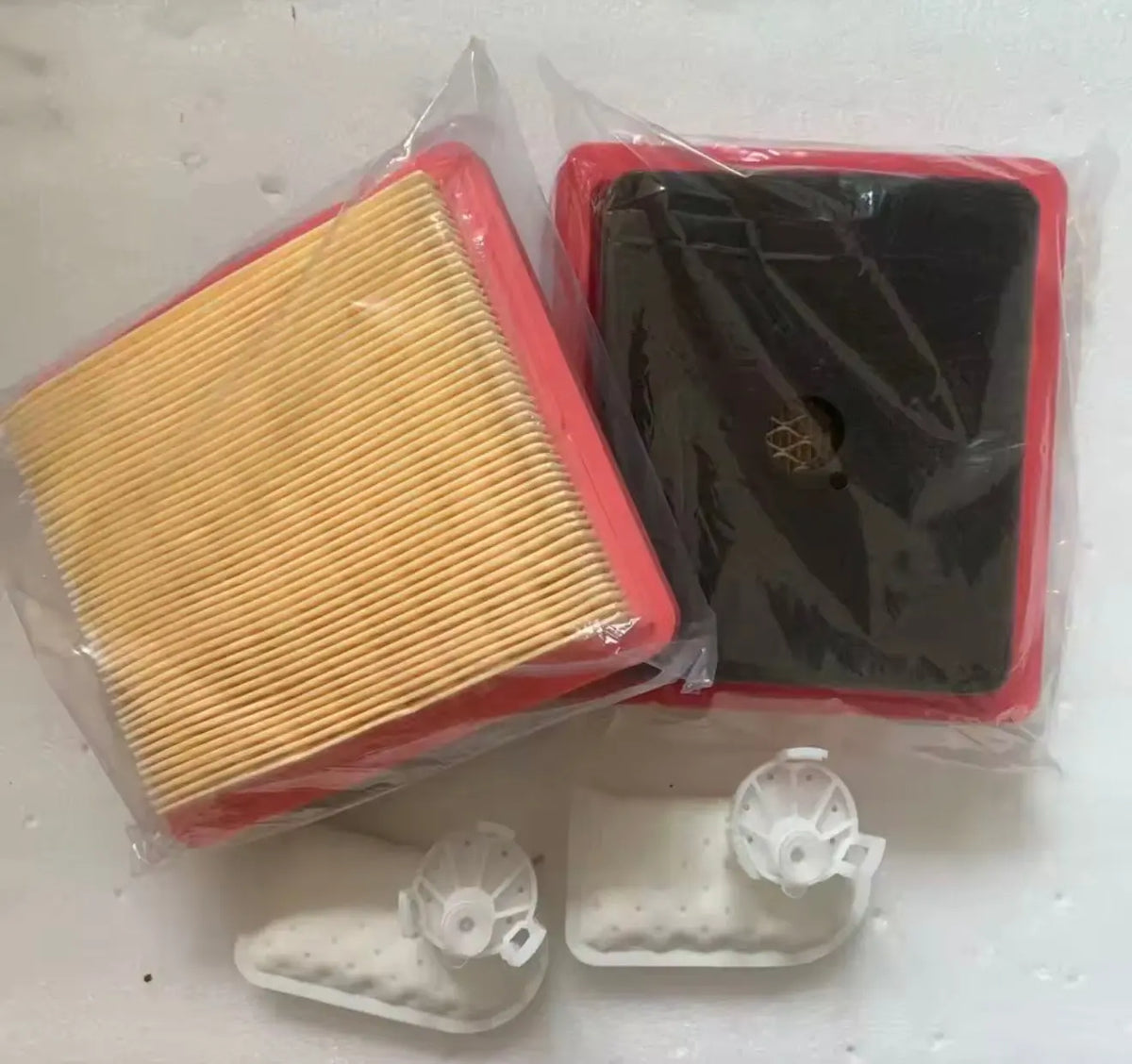DJI generator oil filter service kit with yellow pleated filter, black filter, and white clips