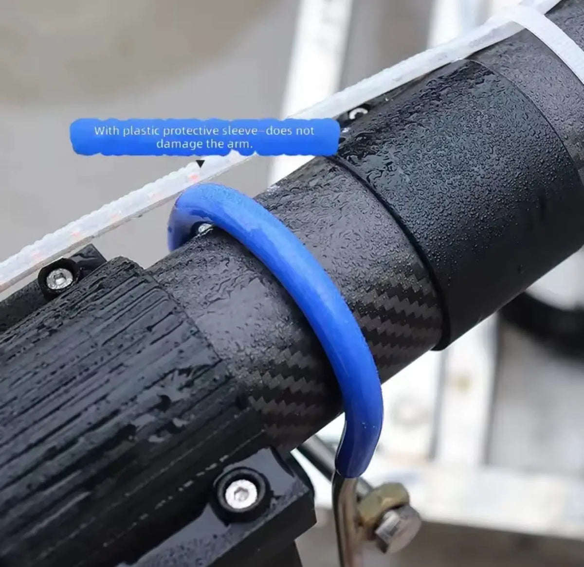 DJI bracket with blue protective sleeve on carbon-fiber arm mounting clip