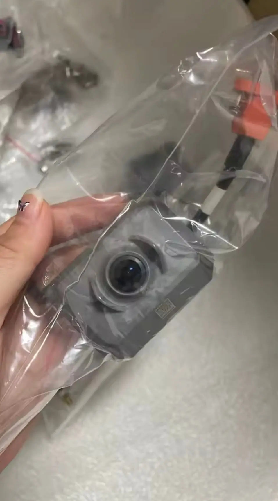 DJI Agras T100 front frame camera module in protective bag