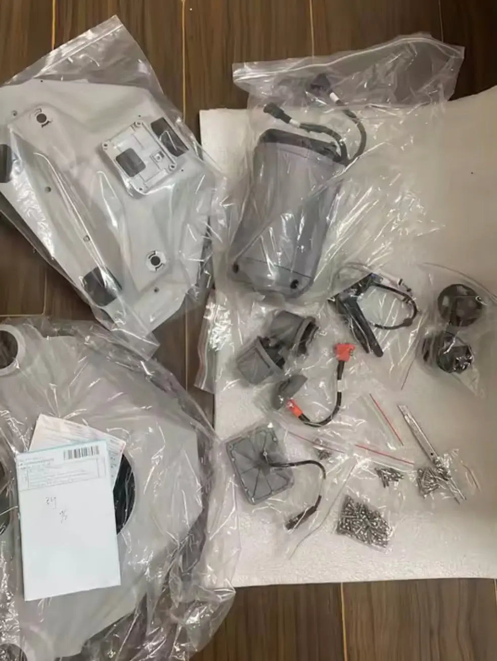 Front frame components set in sealed bags for DJI Agras T100