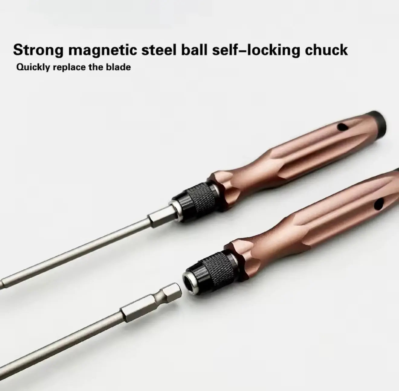 Two magnetic screwdrivers with copper handles, black textured chucks, metal shafts