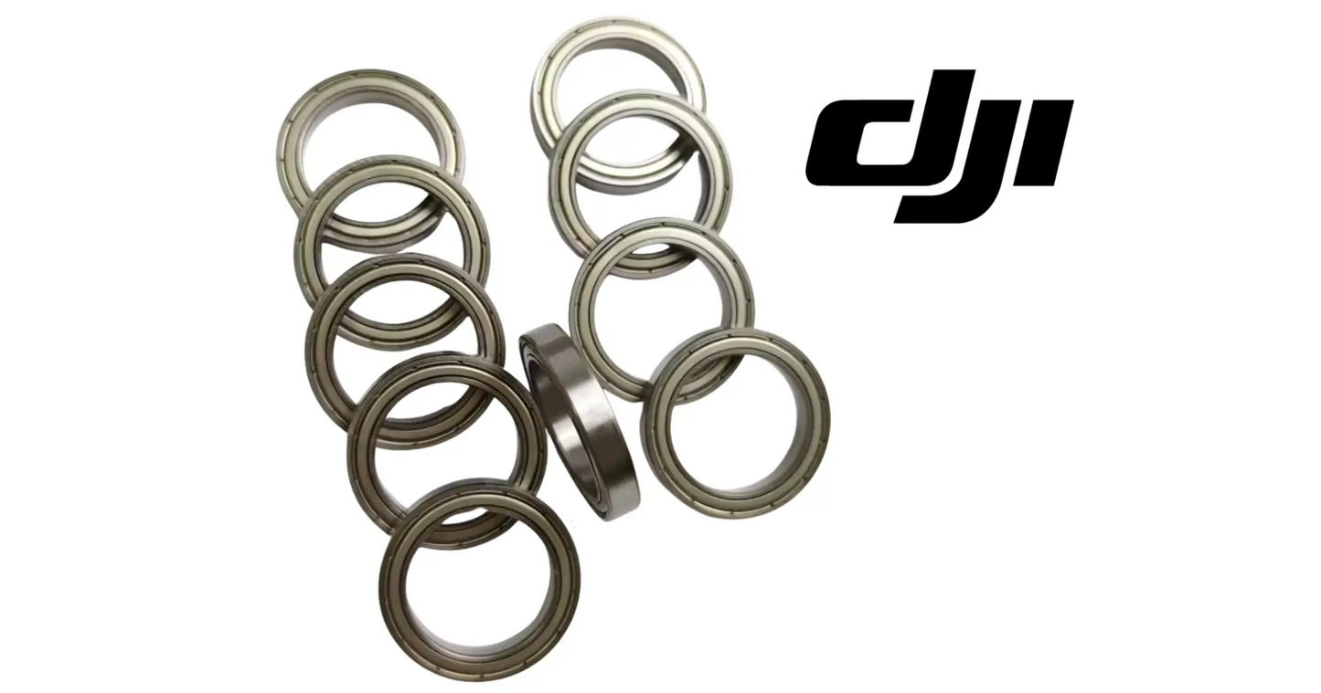 DJI motor bearing set with multiple silver metal rings and spacers