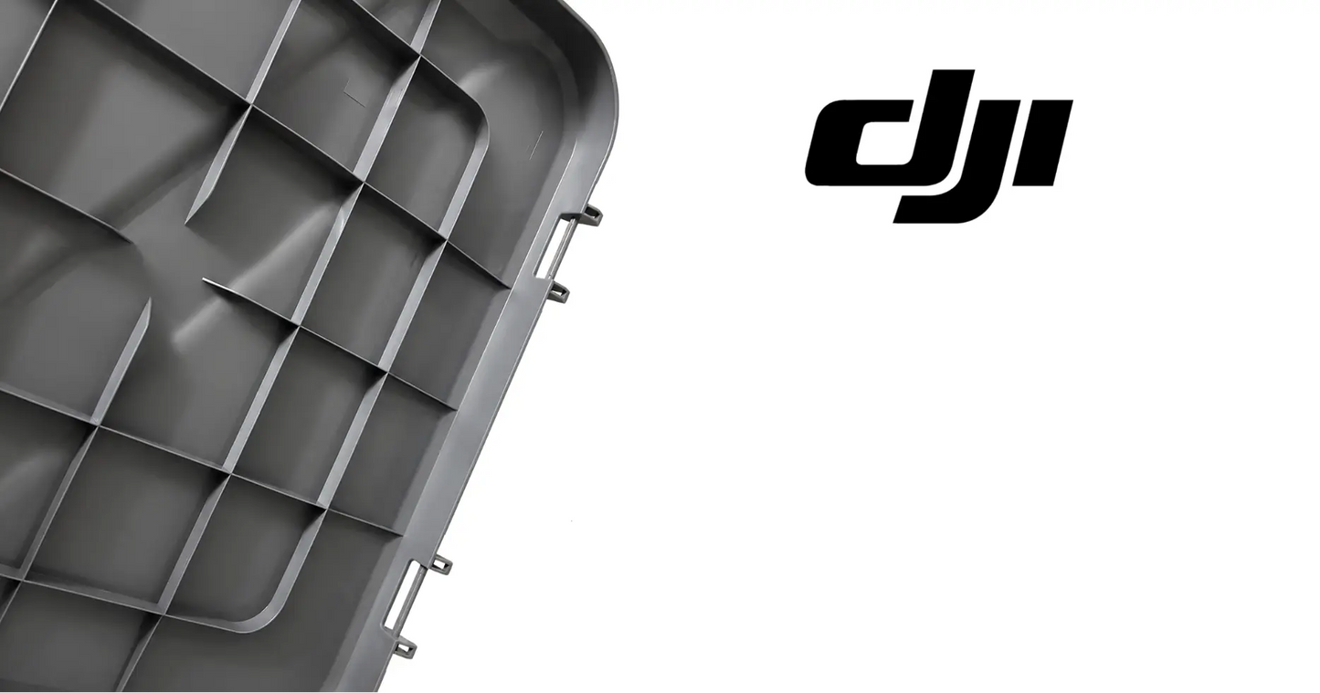 DJI tank lid interior with open grid partitions and side mounting clips