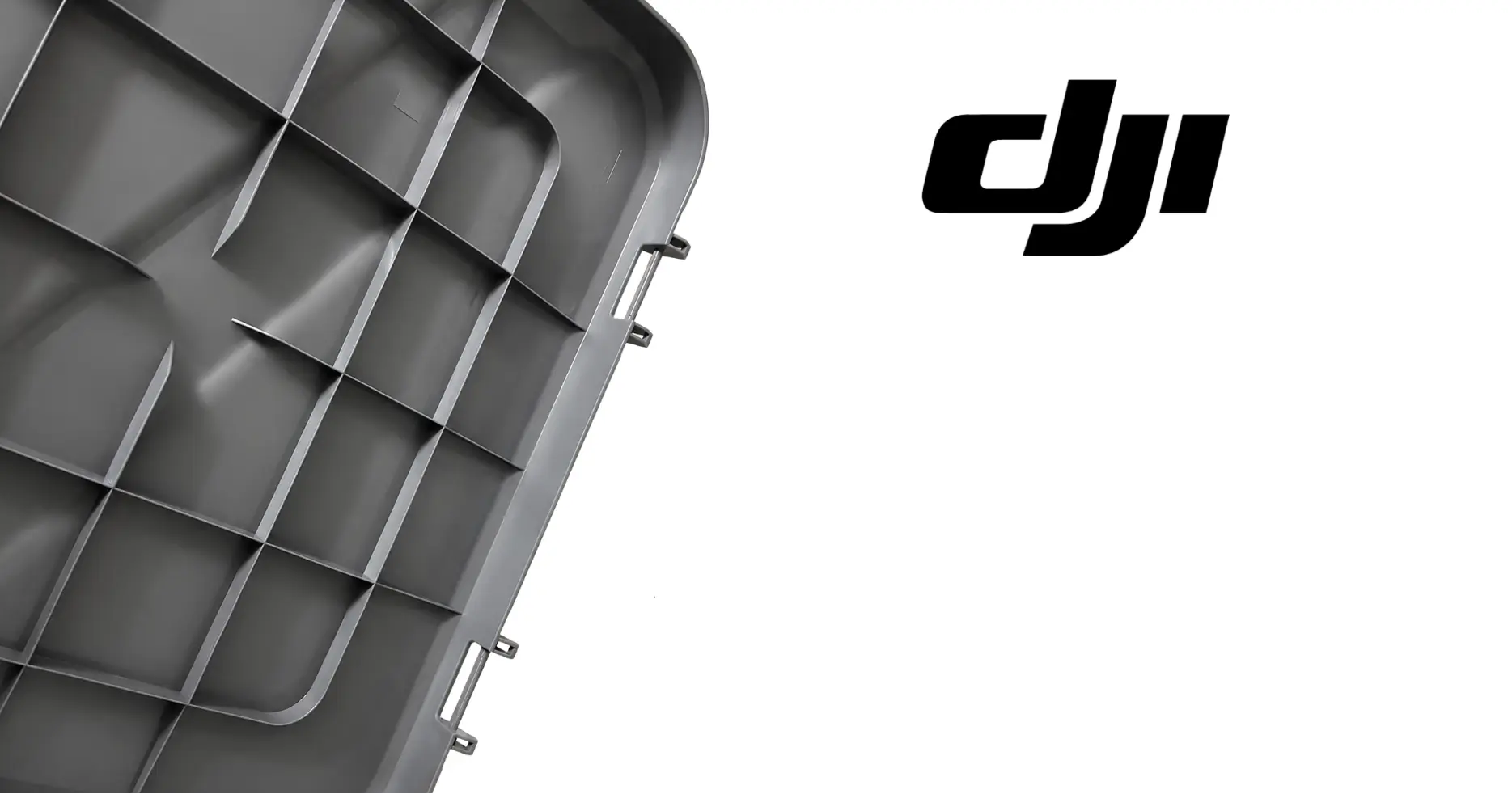 DJI tank lid interior with open grid partitions and side mounting clips