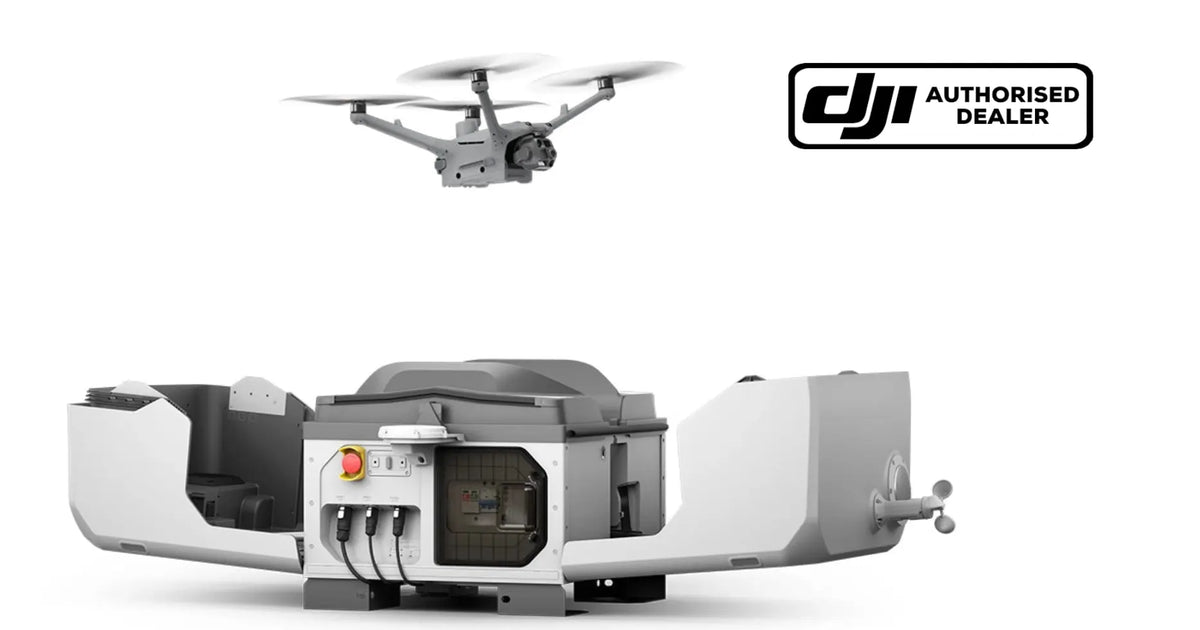 DJI surveillance docking station with drone docked above and side arms open