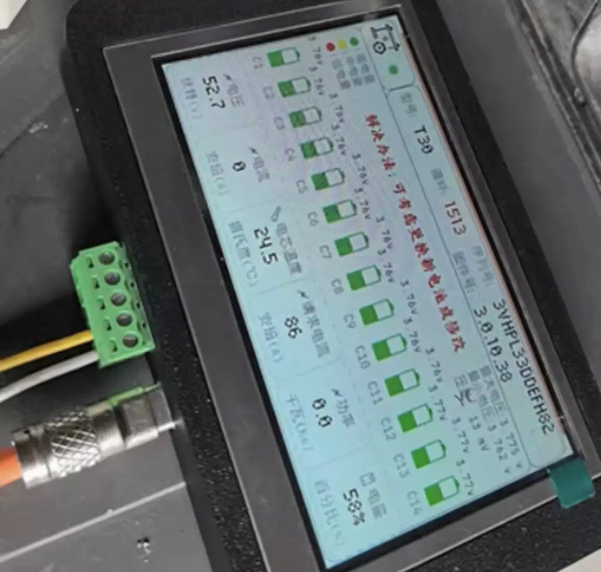 Battery diagnostic reader touchscreen with green terminal board and cable connections