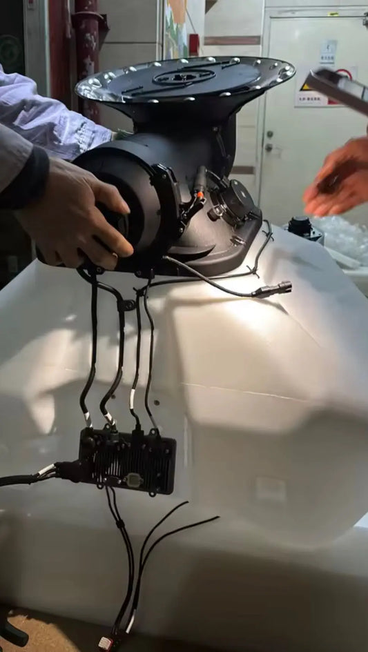 DJI Agras granular tank and spreader assembly with black fan and cable harness