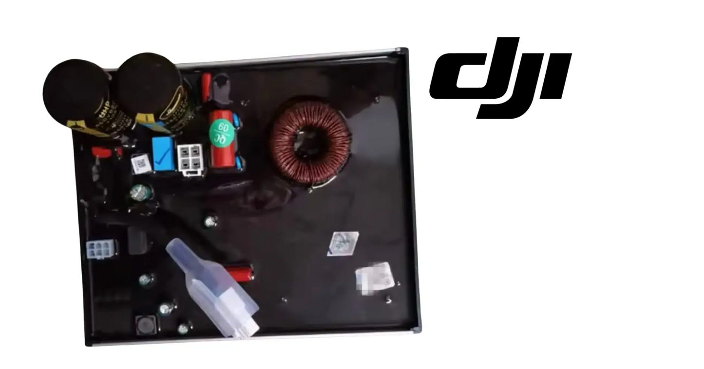 DJI inverter power module open with copper coil, parts, and wiring components