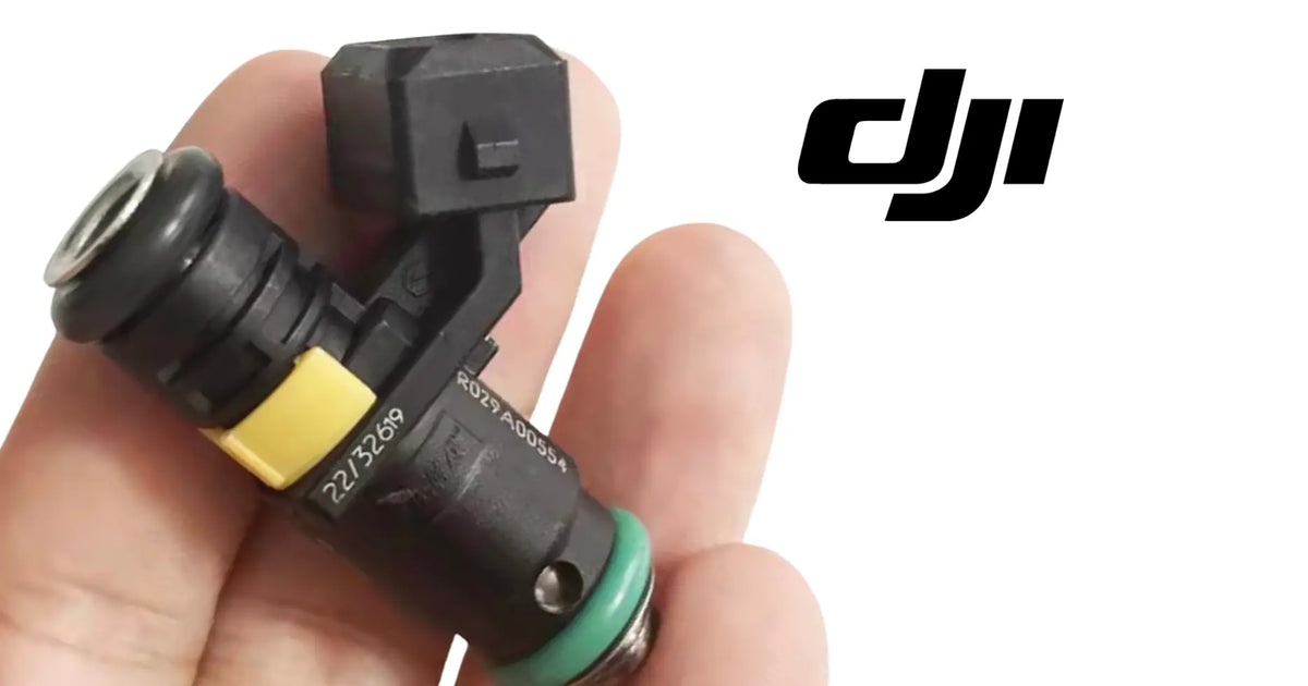 DJI electric injector nozzle, black body with green seal and yellow band detail