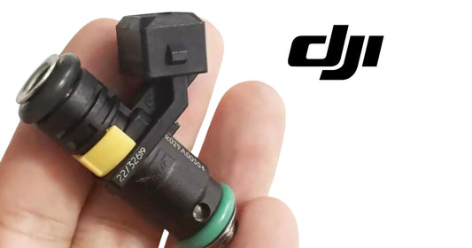 DJI electric injector nozzle, black body with green seal and yellow band detail