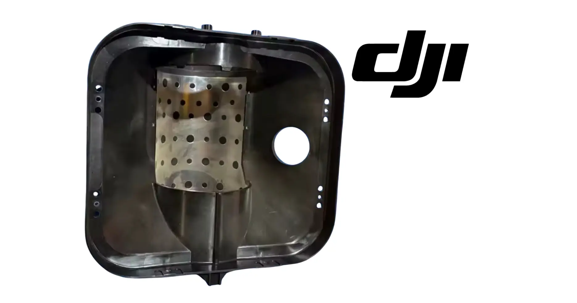 DJI Agras T100 auger shell housing with perforated liner, top view