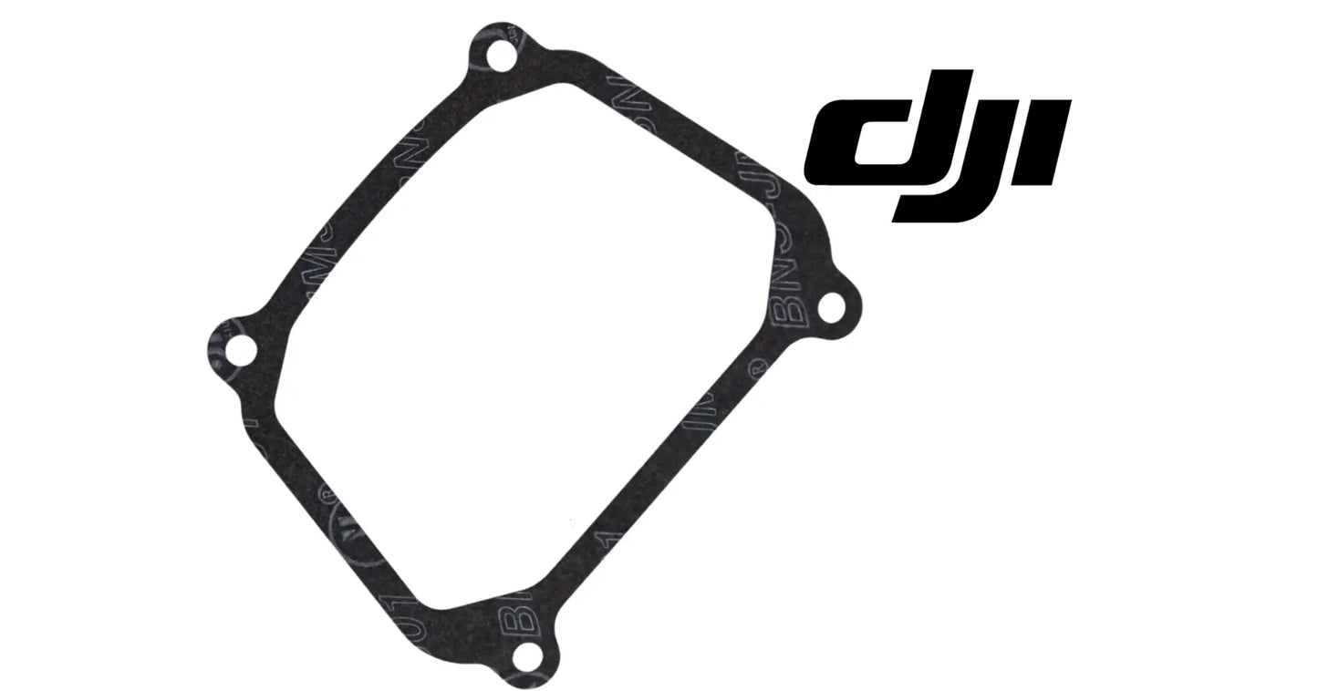 DJI gasket seal for cover plate, angled view of black square rubber with four holes