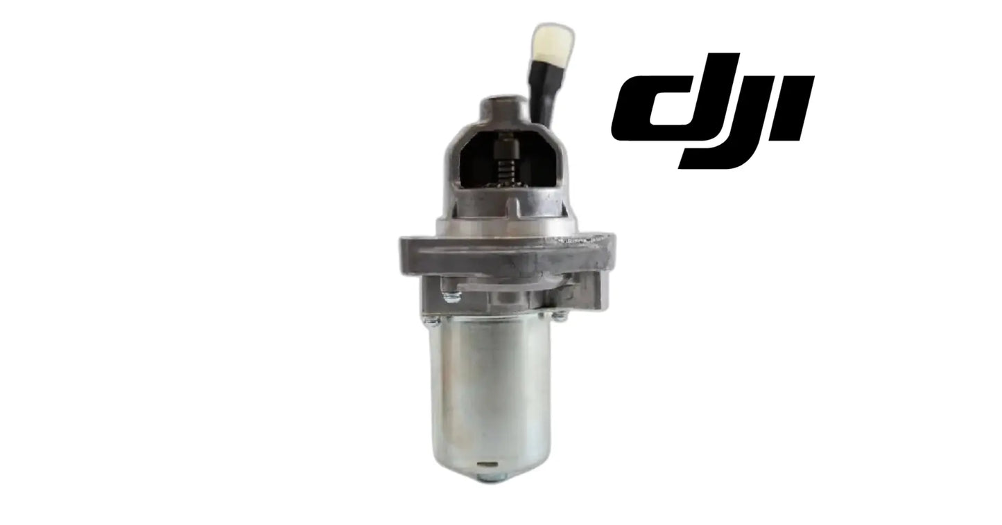 Electric generator starter motor with cylindrical metal housing and black electrical connector