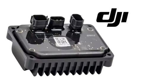 DJI spreader control module top view with three black connectors, cooling fins