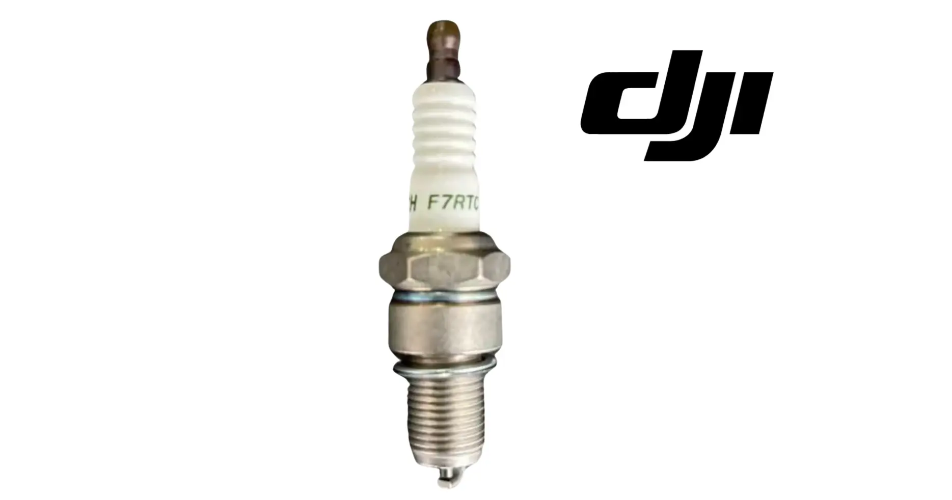 Spark plug with white ceramic insulator and metal electrode, DJI
