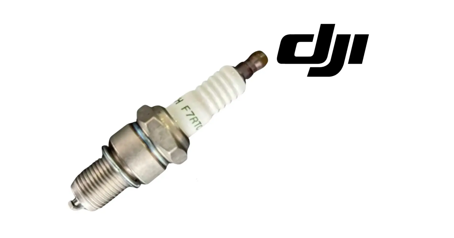 Spark plug angled view with white ceramic insulator and hex base, DJI