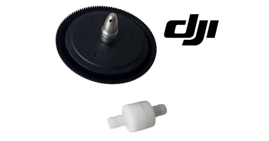 Centrifugal nozzle service kit: black impeller disc with central shaft and white nozzle filter