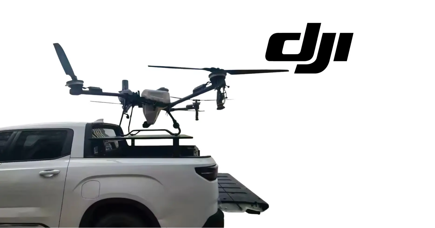 DJI truck UAV launch trailer side view with drone over cargo bed