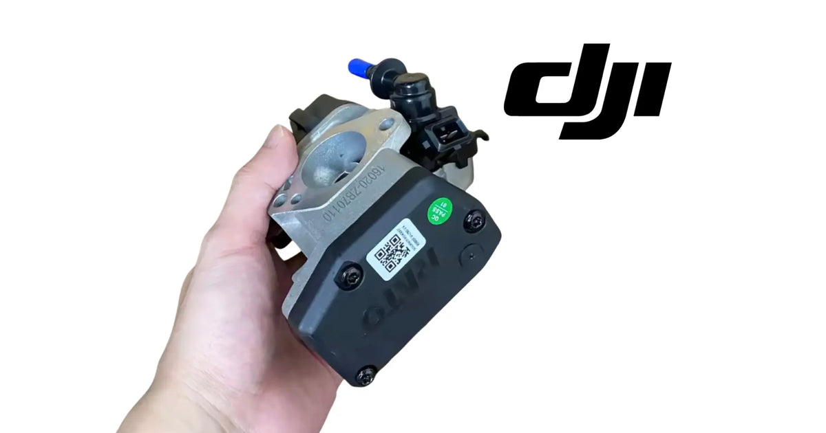 DJI Agras T50 generator ECU module, black with green button and cable connector