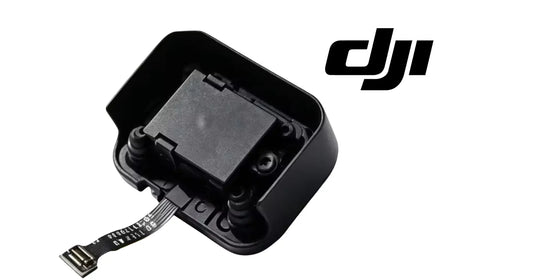 DJI IMU module in black housing with ribbon cable connector
