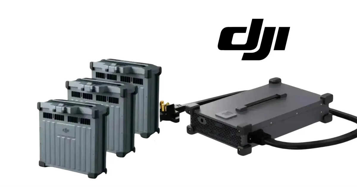 DJI charging base with three gray battery packs and power cable