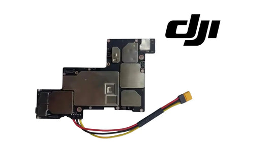 DJI main circuit board with multiple connectors and red, yellow, black wire leads