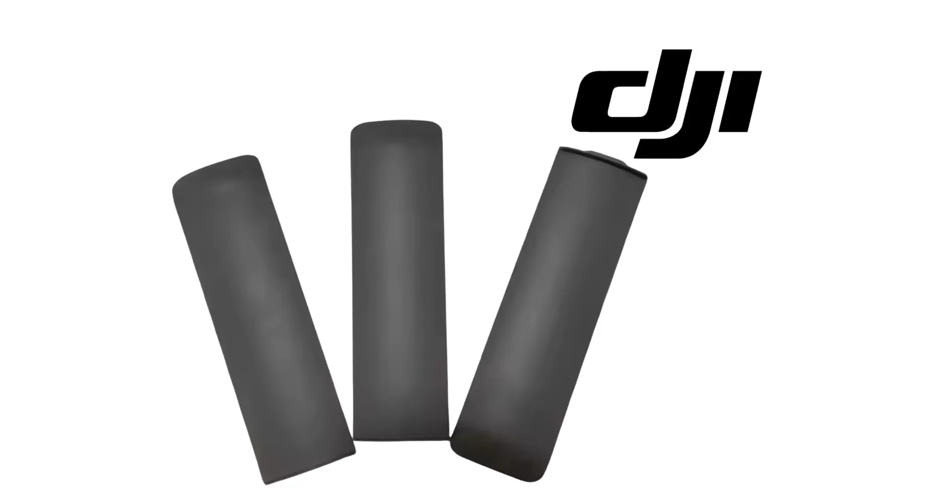 Three dark gray cable cover plates arranged upright.
