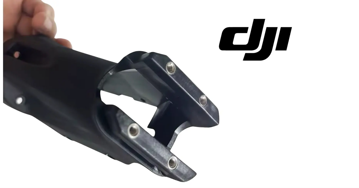 DJI T100 nozzle cover shell, black curved housing with metal pins and plate