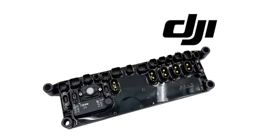 DJI Agras distribution board module PCB, top view showing black circuit details and ports