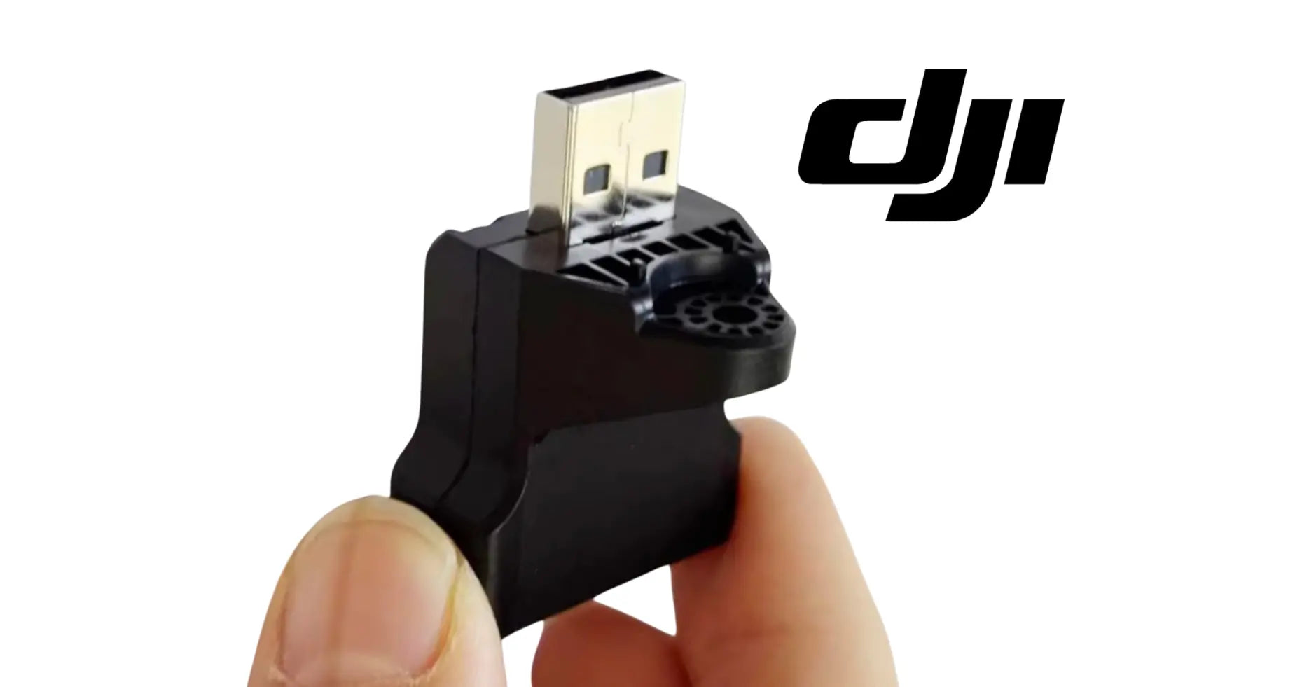 DJI Agras RTK adapter module with USB-A plug, black housing.