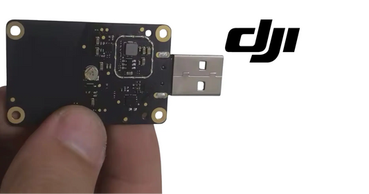 DJI RTK interface PCB with USB connector, small chips, and mounting pads