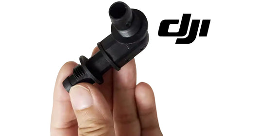 Black plastic one-way valve elbow fitting with threaded connections