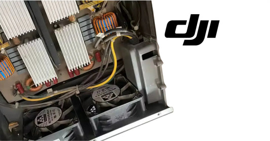 DJI Agras AC-DC power module with cooling fan and control components close-up
