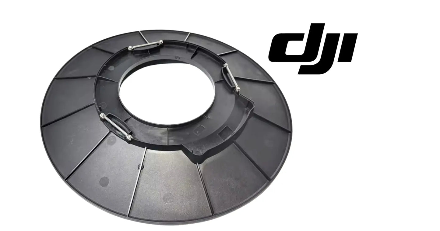 DJI Agras T50 spreading system baffle, dark circular plastic ring with metal clip hardware