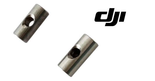 Two metal arm locking rotation shafts with dark center bores